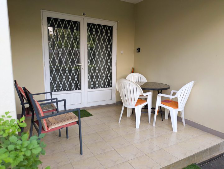 Front patio with table and chairs